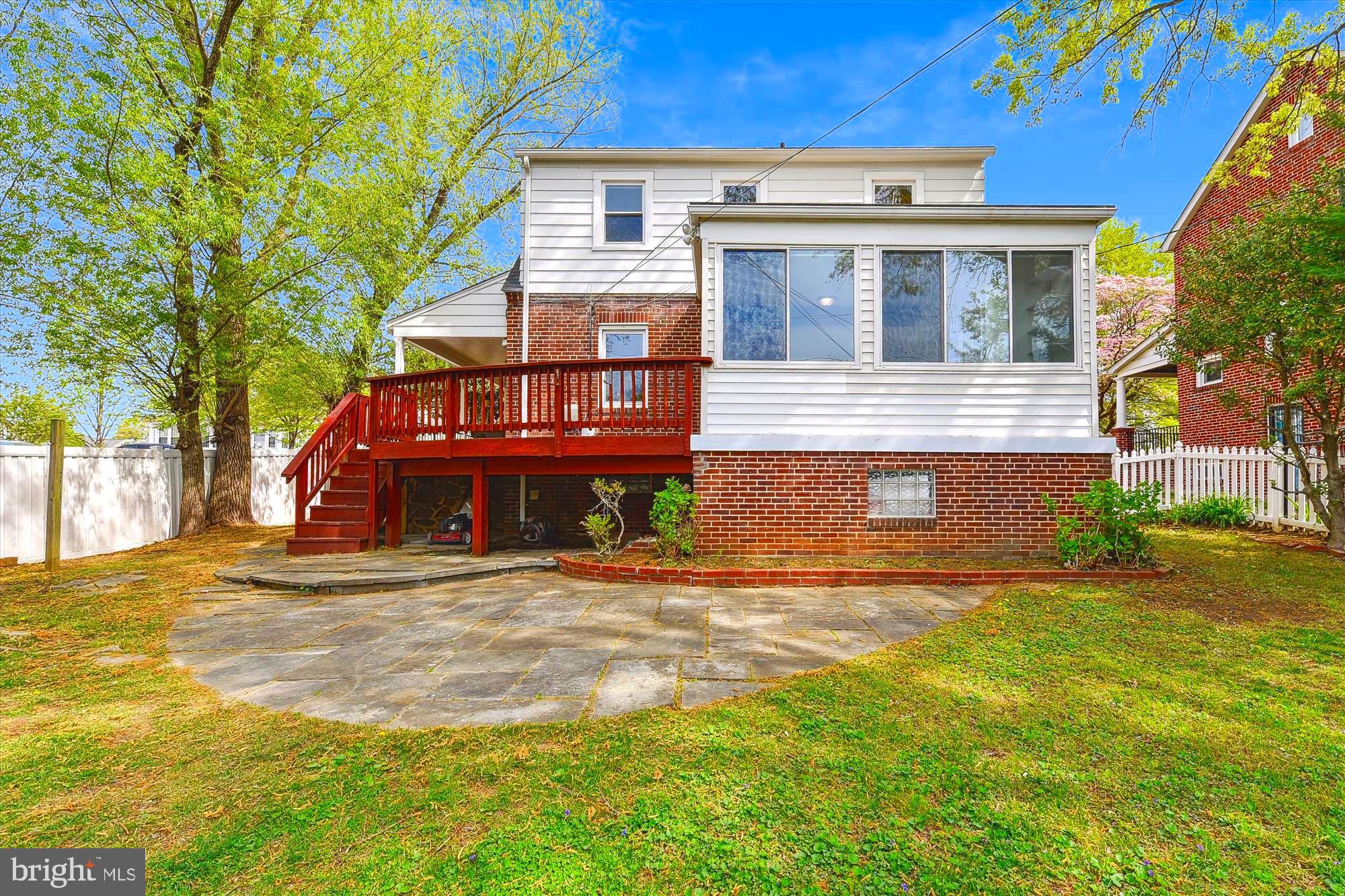 501 Dunkirk Road Baltimore, MD 21212 - Photo 29 of 38 a view of a house with a yard and large tree