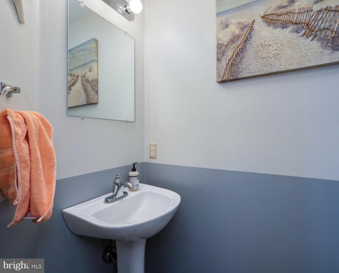 390 Wingspread Drive Reading, PA 19606 - Photo 16 of 21 a bathroom with a sink and a mirror