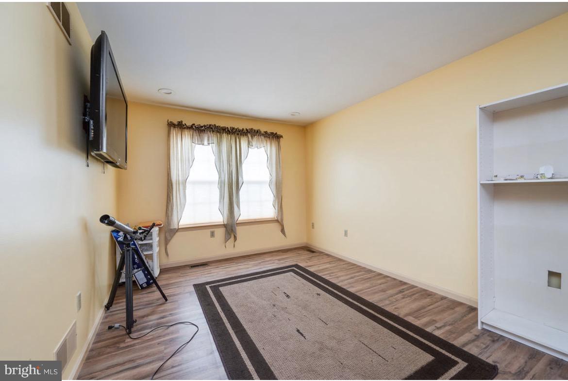 390 Wingspread Drive Reading, PA 19606 - Photo 17 of 21 a view of an empty room with a window