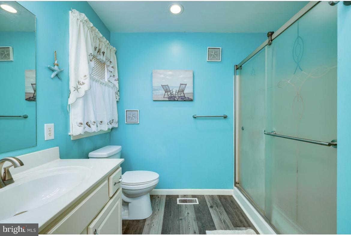 390 Wingspread Drive Reading, PA 19606 - Photo 21 of 21 a bathroom with a sink a toilet and shower