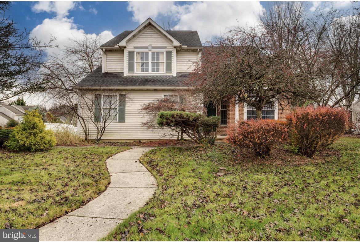 390 Wingspread Drive Reading, PA 19606 - Photo 5 of 21 a front view of a house with garden