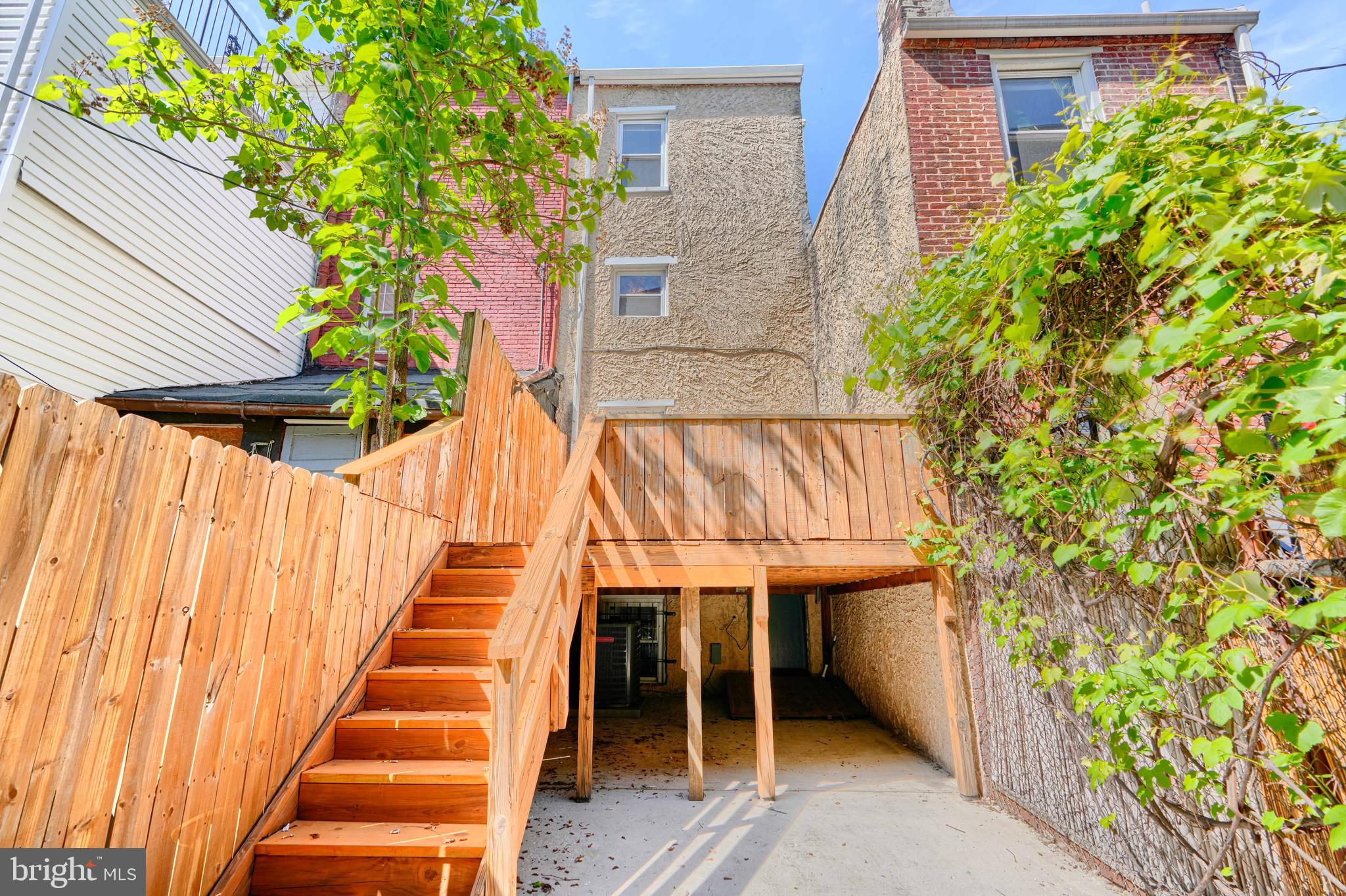 917 Ramsay Street Baltimore, MD 21223 - Photo 23 of 36 Patio has a door to the basement