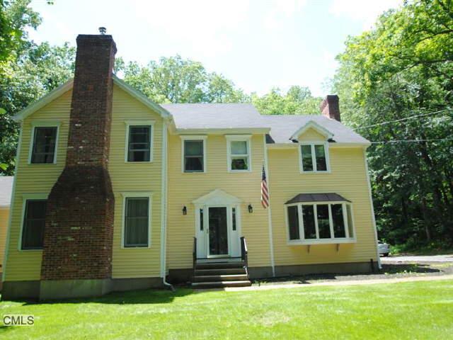 375 Galloping Hill Road Fairfield, CT 06824 - Photo 1 of 1 a front view of a house with a yard