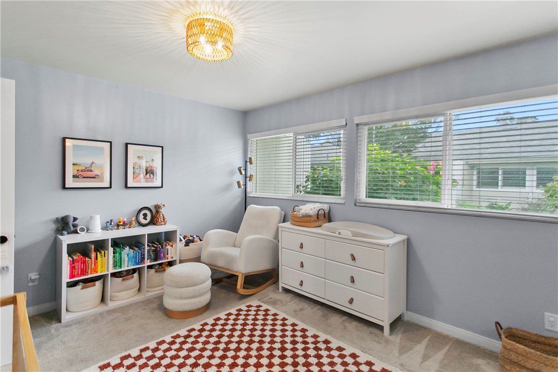 1404 North Tustin Avenue, Unit E2 Santa Ana, CA 92705 - Photo 20 of 27 a living room with furniture and a window