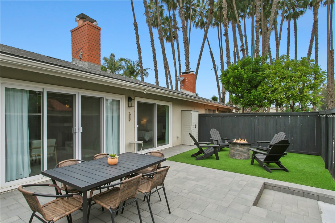 1404 North Tustin Avenue, Unit E2 Santa Ana, CA 92705 - Photo 23 of 27 a view of a chairs and table in a patio