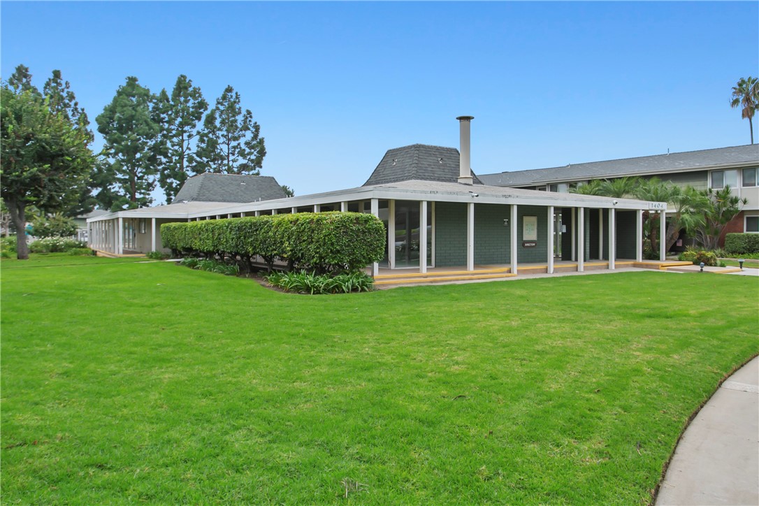 1404 North Tustin Avenue, Unit E2 Santa Ana, CA 92705 - Photo 25 of 27 a view of a house with yard and green space