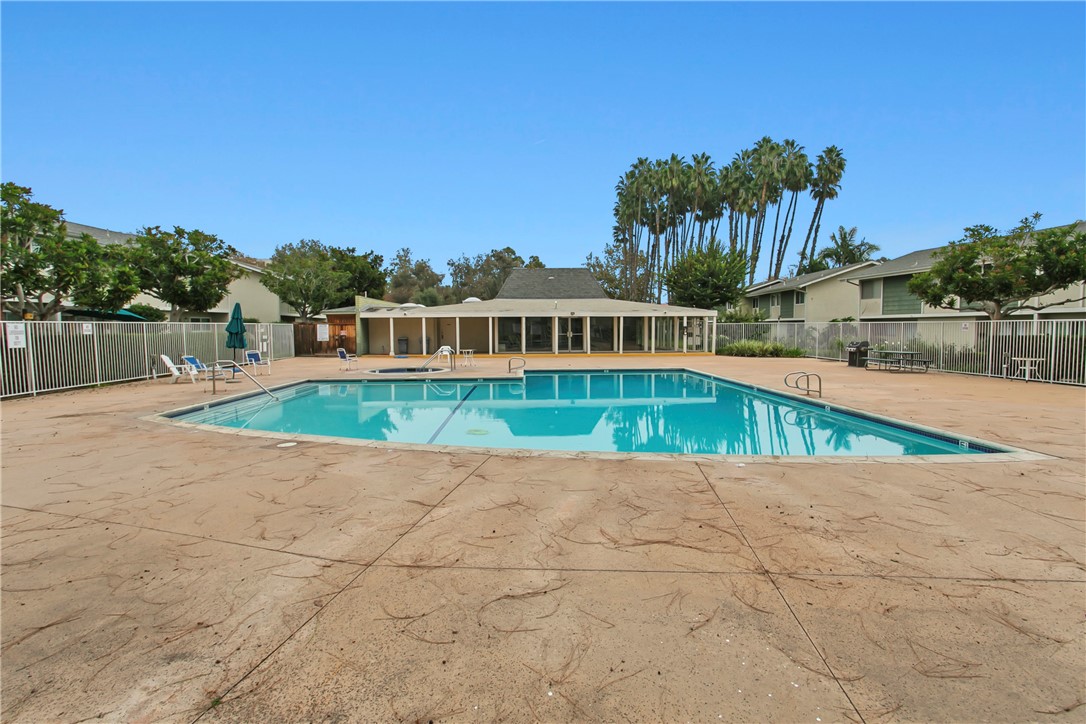 1404 North Tustin Avenue, Unit E2 Santa Ana, CA 92705 - Photo 26 of 27 a view of a swimming pool with a patio