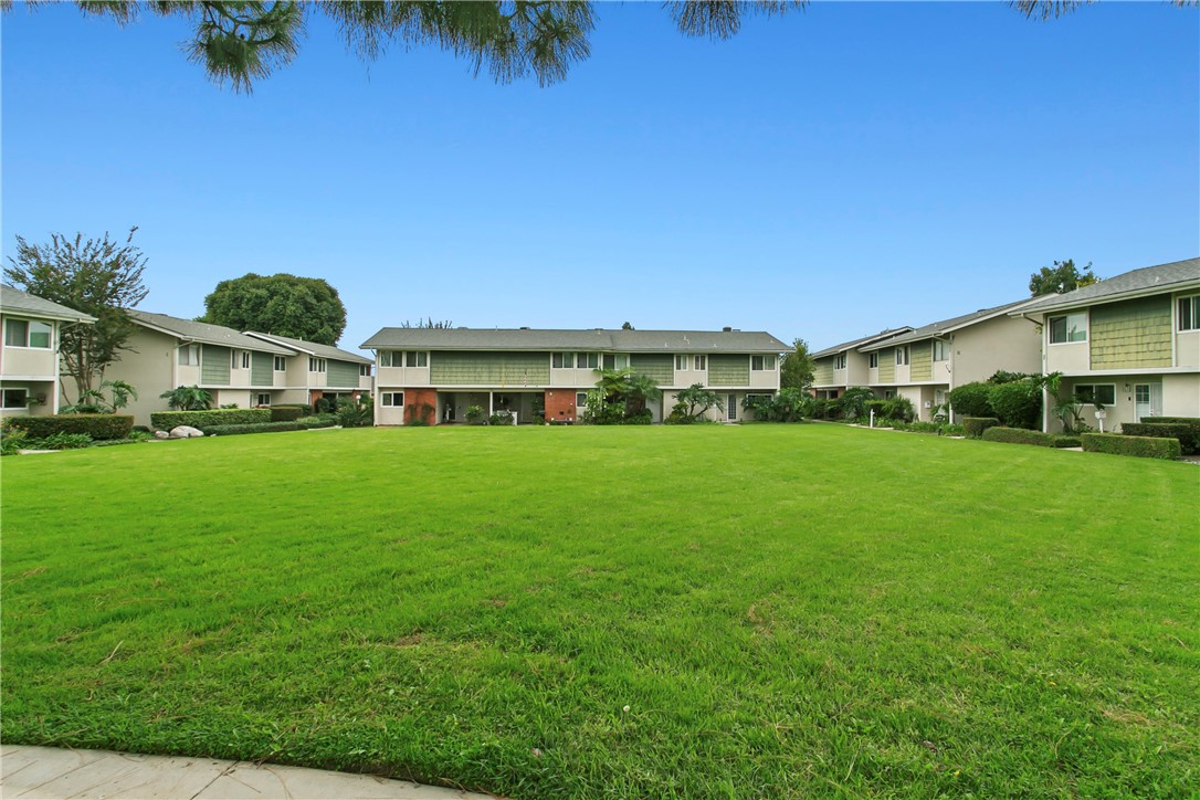 1404 North Tustin Avenue, Unit E2 Santa Ana, CA 92705 - Photo 27 of 27 a front view of house with yard