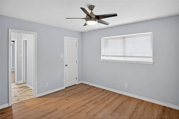 a bathroom with a sink vanity and a mirror
