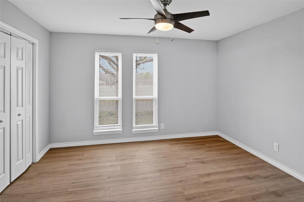 835 38th Street Southeast Paris, TX 75462 - Photo 18 of 25 wooden floor in an empty room with a window