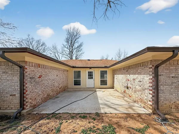a view of a yard covered in snow