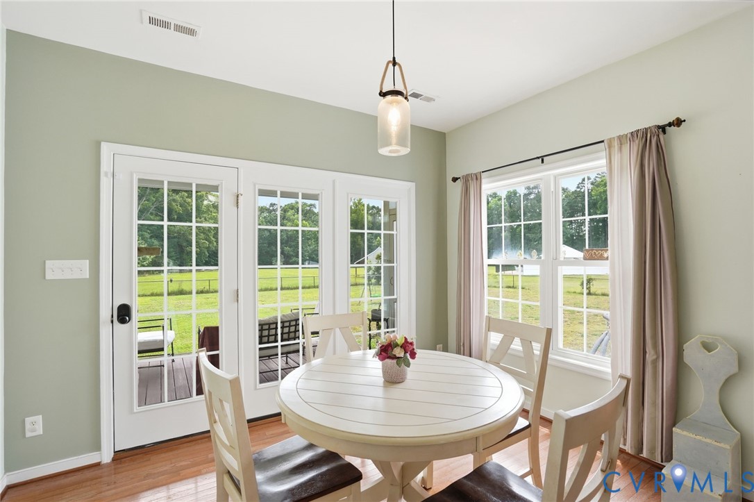 5305 Wellington Ridge Road Richmond, VA 23231 - Photo 21 of 67 Dining area featuring a contemporary pendant light