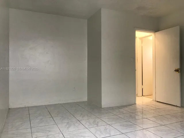 an empty room with closet