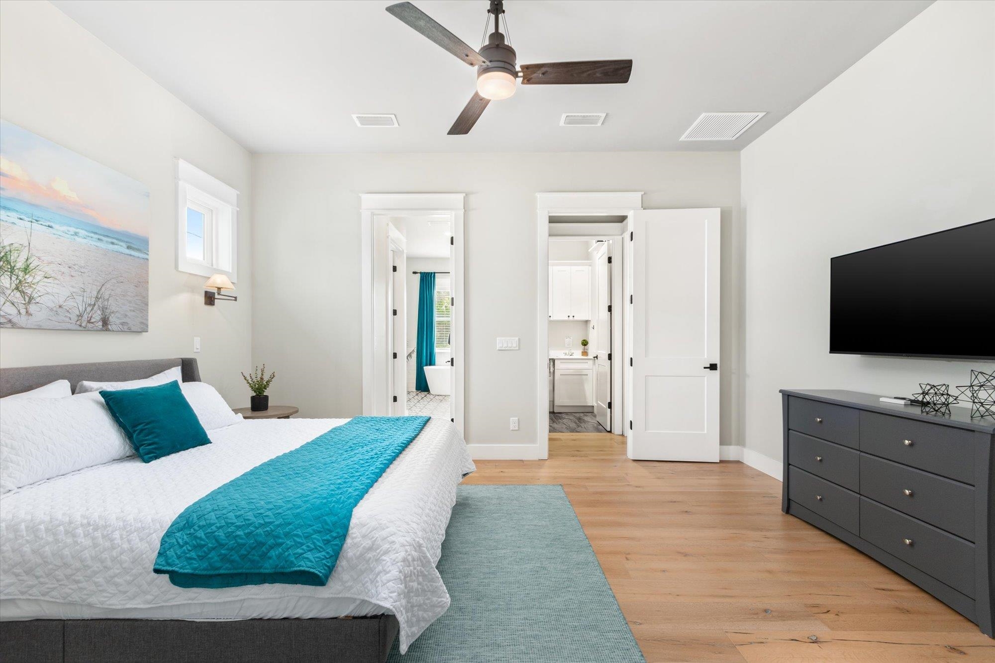 80 Ferrol Road St. Augustine, FL 32084 - Photo 20 of 61 a bedroom with a bed and a flat screen tv