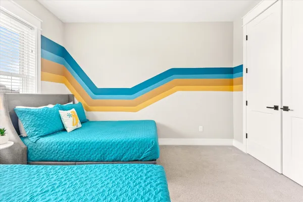 a view of a patio with table and chairs and potted plants