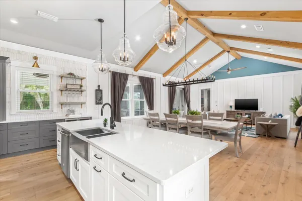 a kitchen with a stove and cabinets