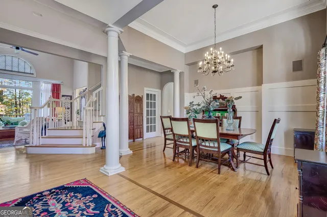 a bedroom with furniture and a book shelf