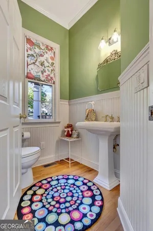 a kitchen with a sink cabinets and window