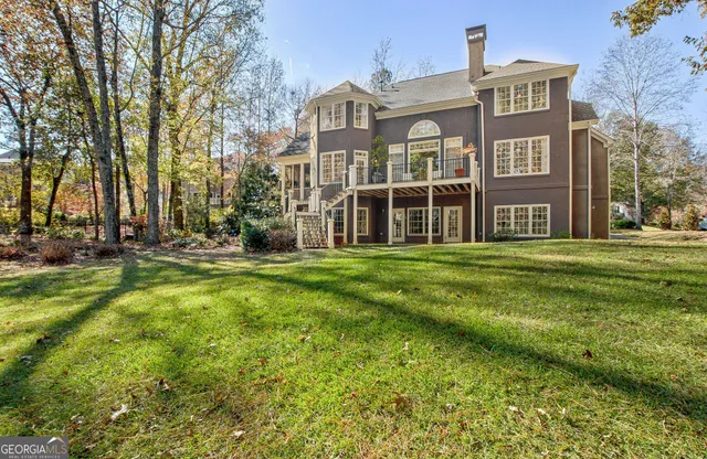 a view of a park with large trees