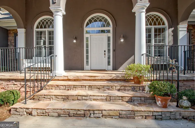 front view of a house with a garden