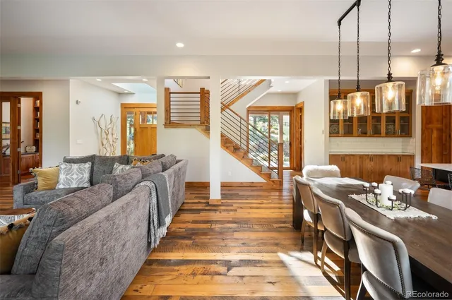 a bed room with furniture and a chandelier