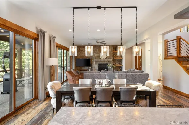 a view of a dining room with furniture window and outside view