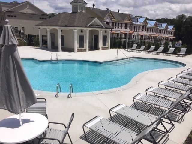 257 Franklin Road Sandy Springs, GA 30342 - Photo 1 of 14 a view of a house with pool and chairs