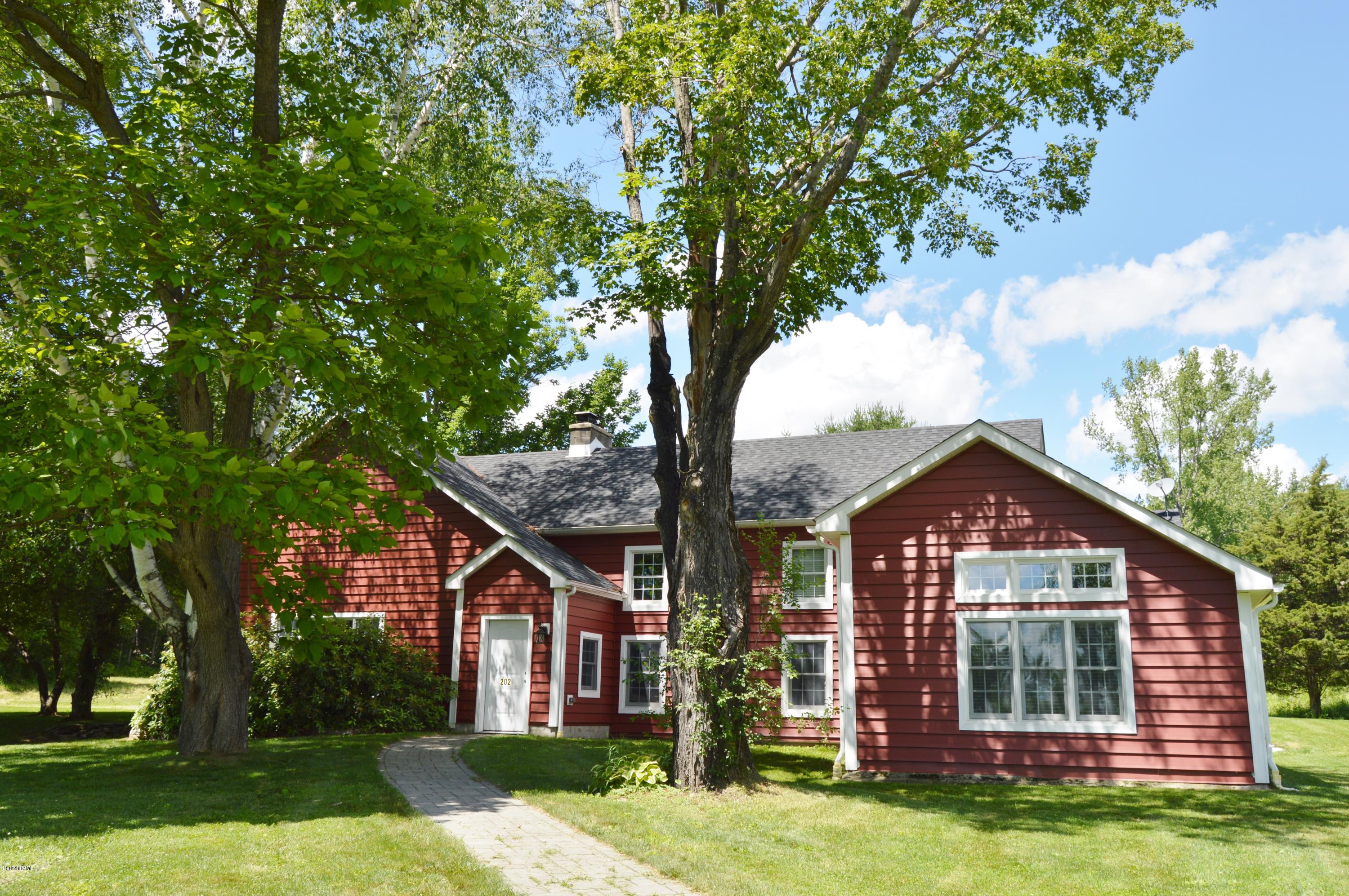 202-204 Whitman Road Hancock, MA 01267 - Photo 1 of 59 front view of a house with a yard