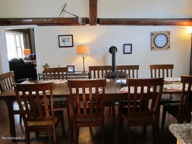 202-204 Whitman Road Hancock, MA 01267 - Photo 23 of 59 a view of a dining room with furniture and wooden floor