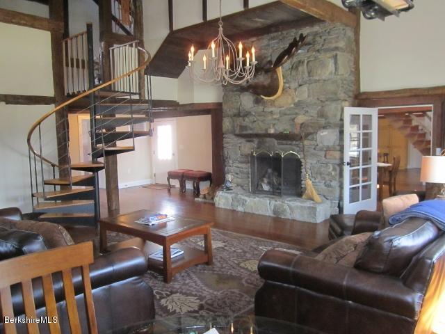 202-204 Whitman Road Hancock, MA 01267 - Photo 27 of 59 a living room with furniture and a fireplace