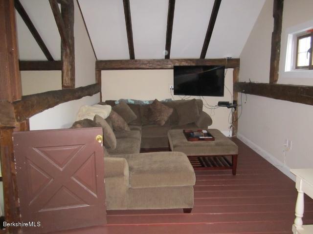 202-204 Whitman Road Hancock, MA 01267 - Photo 33 of 59 a living room with furniture and a flat screen tv