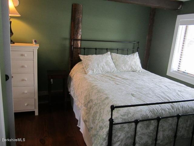 202-204 Whitman Road Hancock, MA 01267 - Photo 38 of 59 a bed sitting in a bedroom next to a window