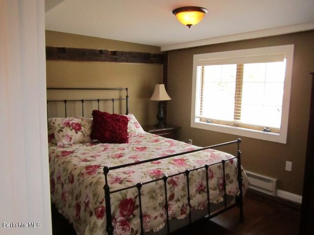 202-204 Whitman Road Hancock, MA 01267 - Photo 39 of 59 a bedroom with a bed and window
