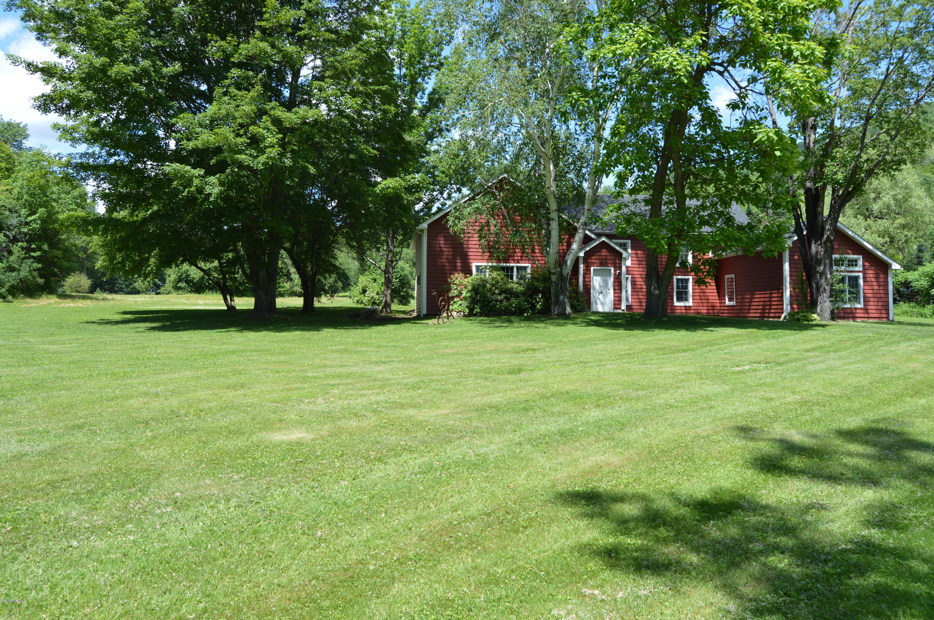 202-204 Whitman Road Hancock, MA 01267 - Photo 58 of 59 a view of a house with a big yard