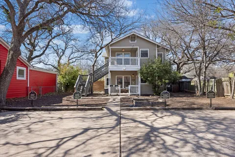 a front view of a house with yard