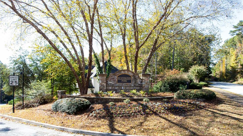 4010 Rockingham Drive Roswell, GA 30075 - Photo 33 of 36 a view of a yard with large trees