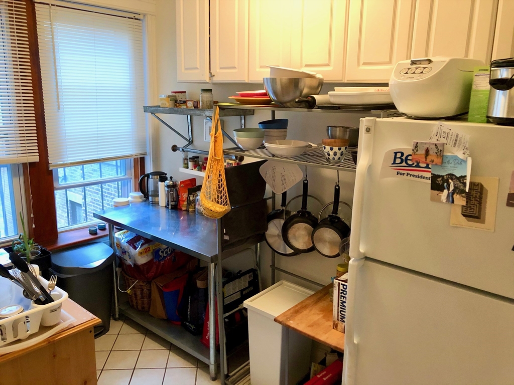 1872 Commonwealth Avenue, Unit 6 Boston, MA 02135 - Photo 11 of 18 a room with storage and utility