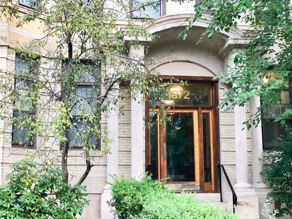 1872 Commonwealth Avenue, Unit 6 Boston, MA 02135 - Photo 17 of 18 front view of a house with a yard