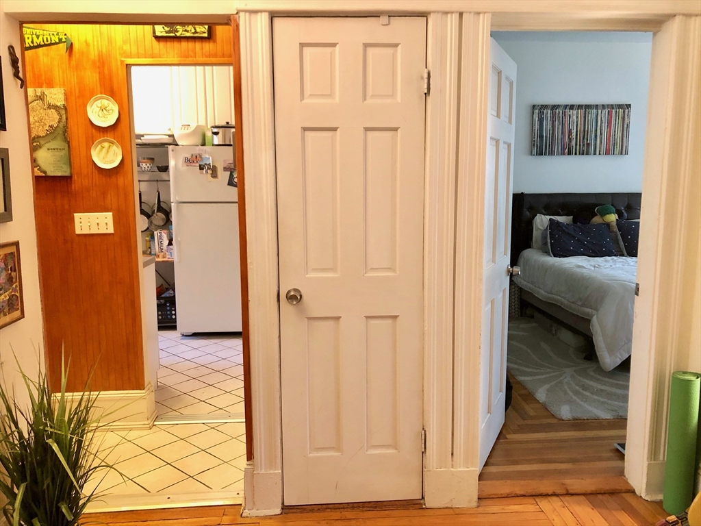 1872 Commonwealth Avenue, Unit 6 Boston, MA 02135 - Photo 6 of 18 a en suite bathroom with a sink and a shower