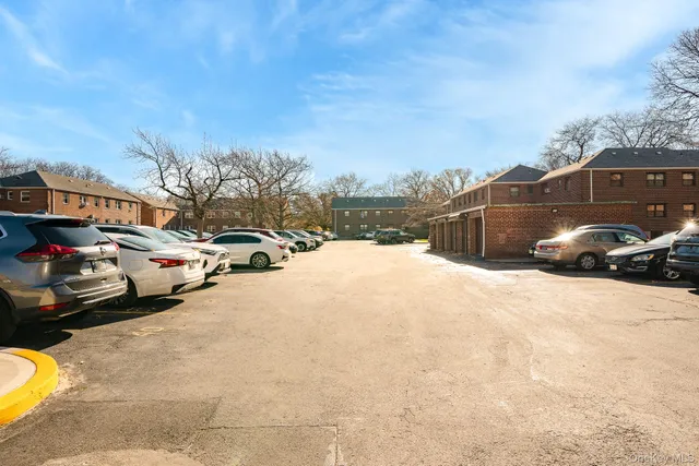 a view of multiple houses with a road
