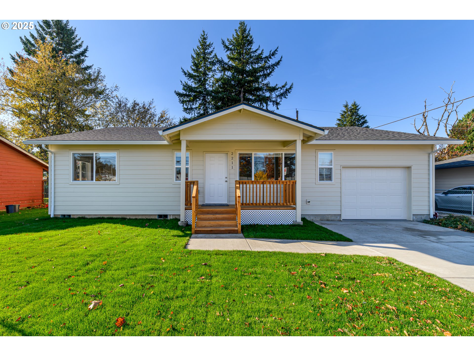 a view of a house with a yard