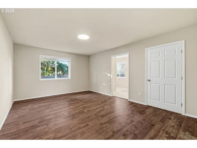 a view of an empty room and window