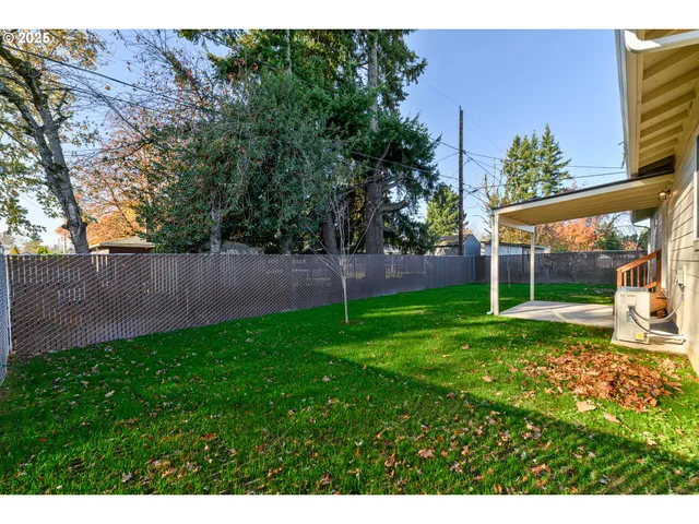a view of a backyard with a garden