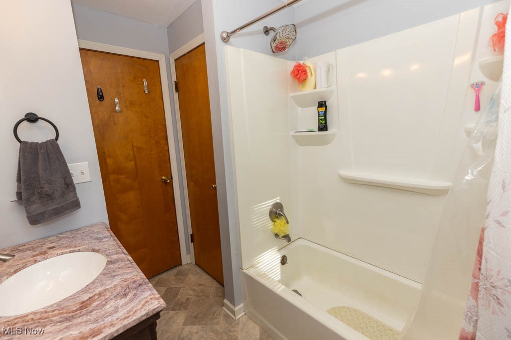 1085 Novak Road Grafton, OH 44044 - Photo 16 of 41 Full bath featuring vanity and shower / tub combo with curtain