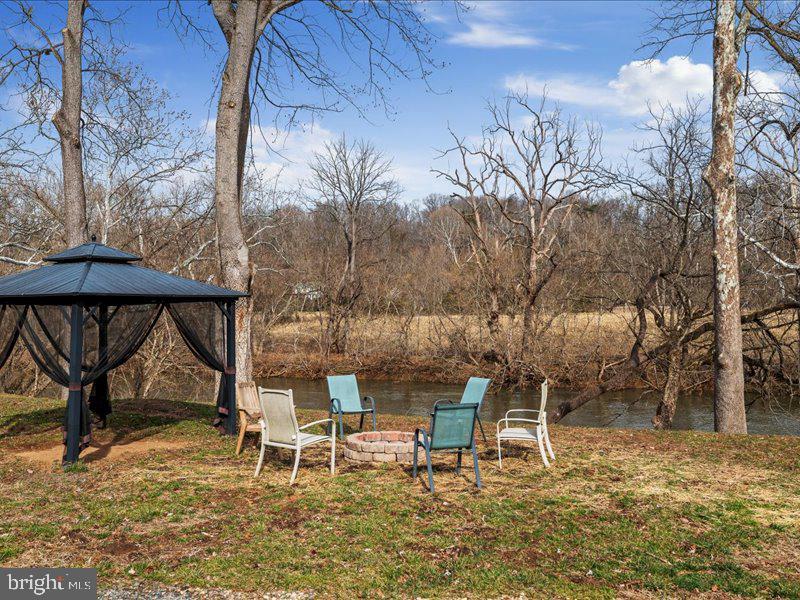 229 Forest View Road Edinburg, VA 22824 - Photo 32 of 53 Gazebo and Fire Pit