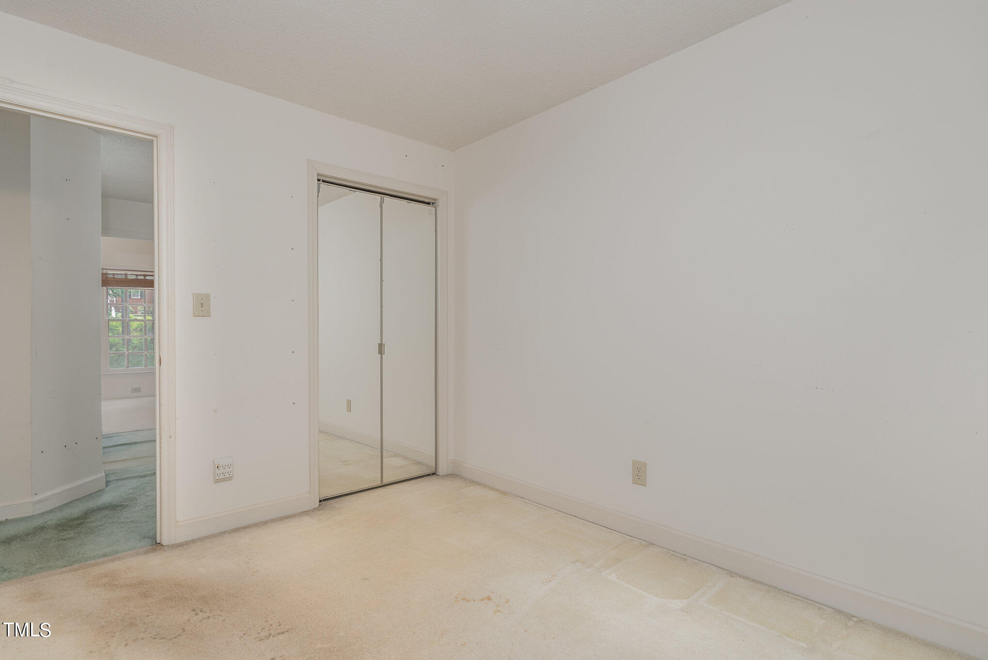 6700 Queen Annes Drive Raleigh, NC 27613 - Photo 16 of 28 an empty room with closet area