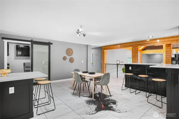 a view of a dining room with furniture window and outside view