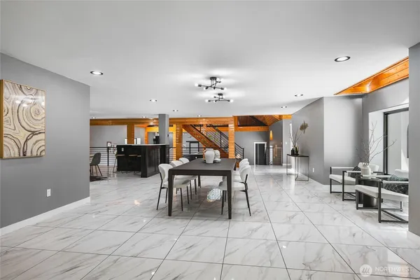 a lobby with furniture and window