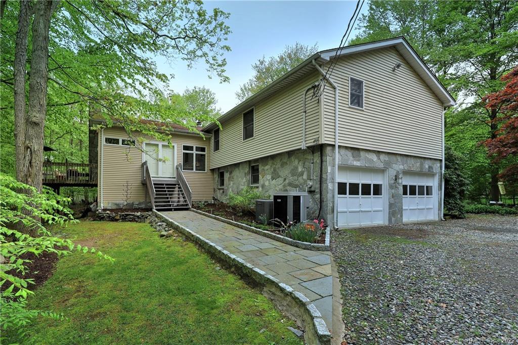 59 Rosebrook Road Milford, CT 06460 - Photo 1 of 1 Welcome to this beautifully maintained bi-level contemporary nestled on 1.14 acres within quiet, desirable neighborhood at the end of a cul-de-sac.