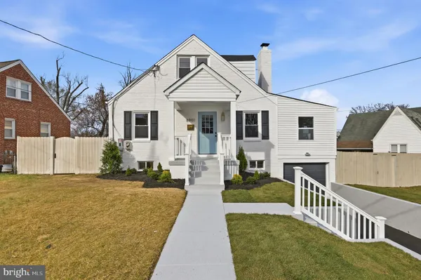 a kitchen with stainless steel appliances granite countertop a refrigerator and microwave